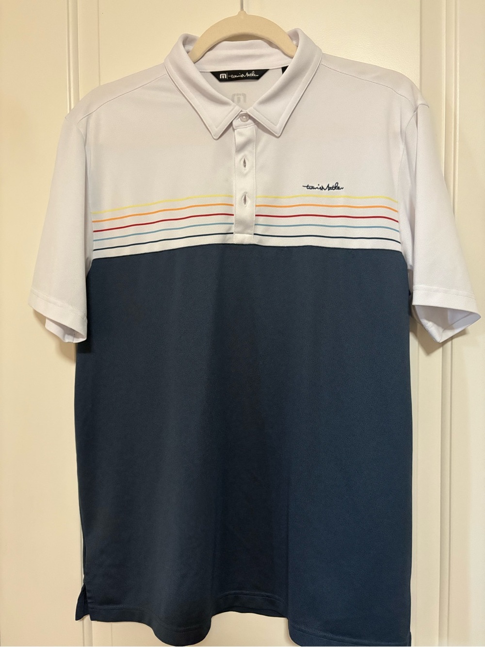 ⛳️⛳️Travis Mathew White and Navy Polo with Multicolor Chest Stripes